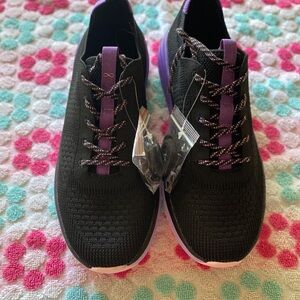 Nfinity Tennis shoes for Women size 9. Purple/black . News
